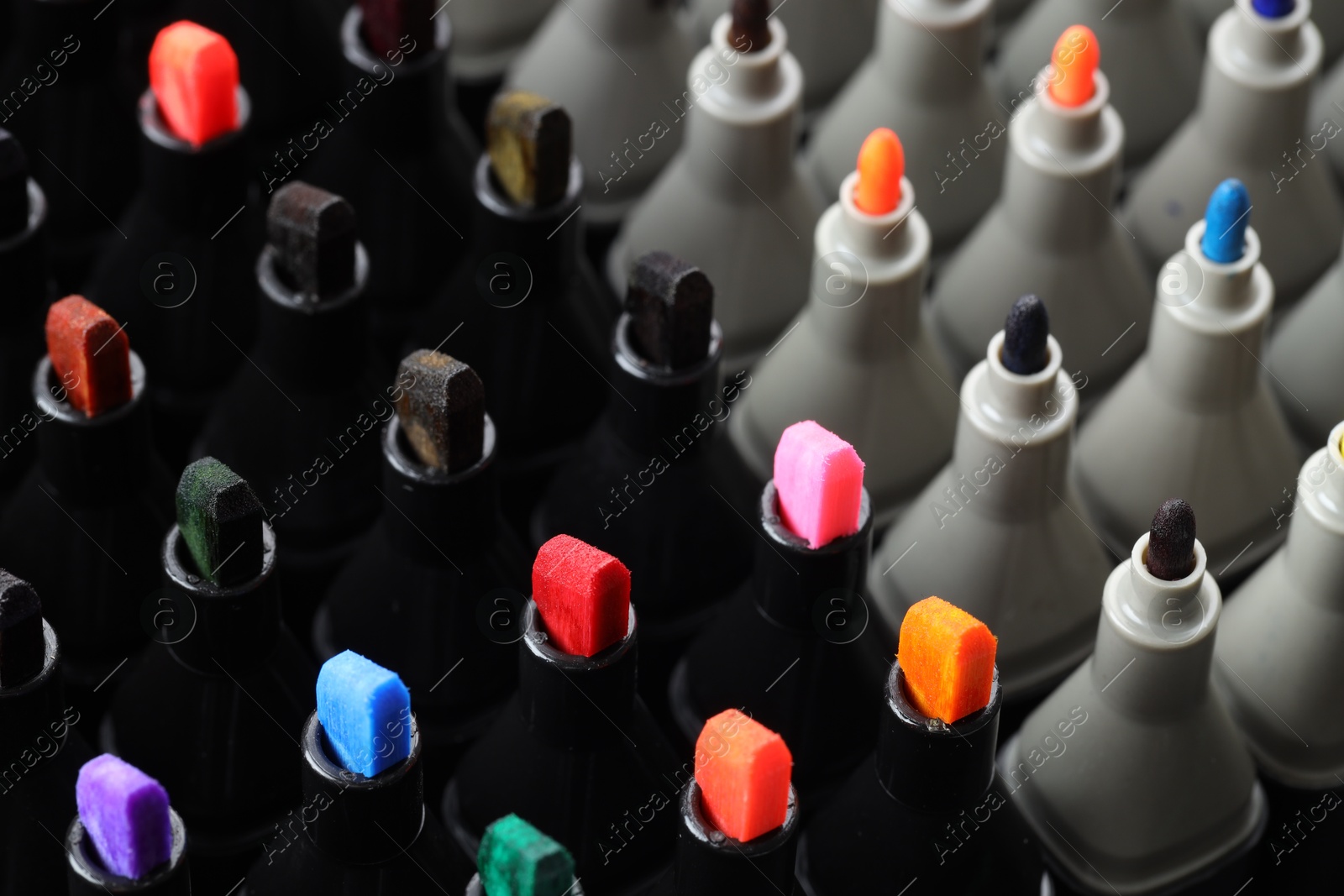 Photo of Many colorful markers as background, closeup. Art supplies