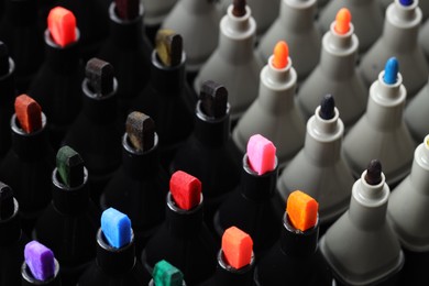 Photo of Many colorful markers as background, closeup. Art supplies