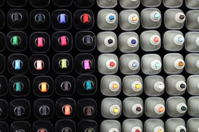 Photo of Many colorful markers as background, top view