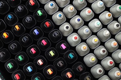 Photo of Many colorful markers as background, top view