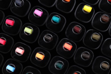 Photo of Many colorful markers as background, top view