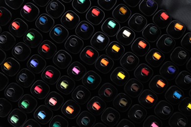 Photo of Many colorful markers as background, top view