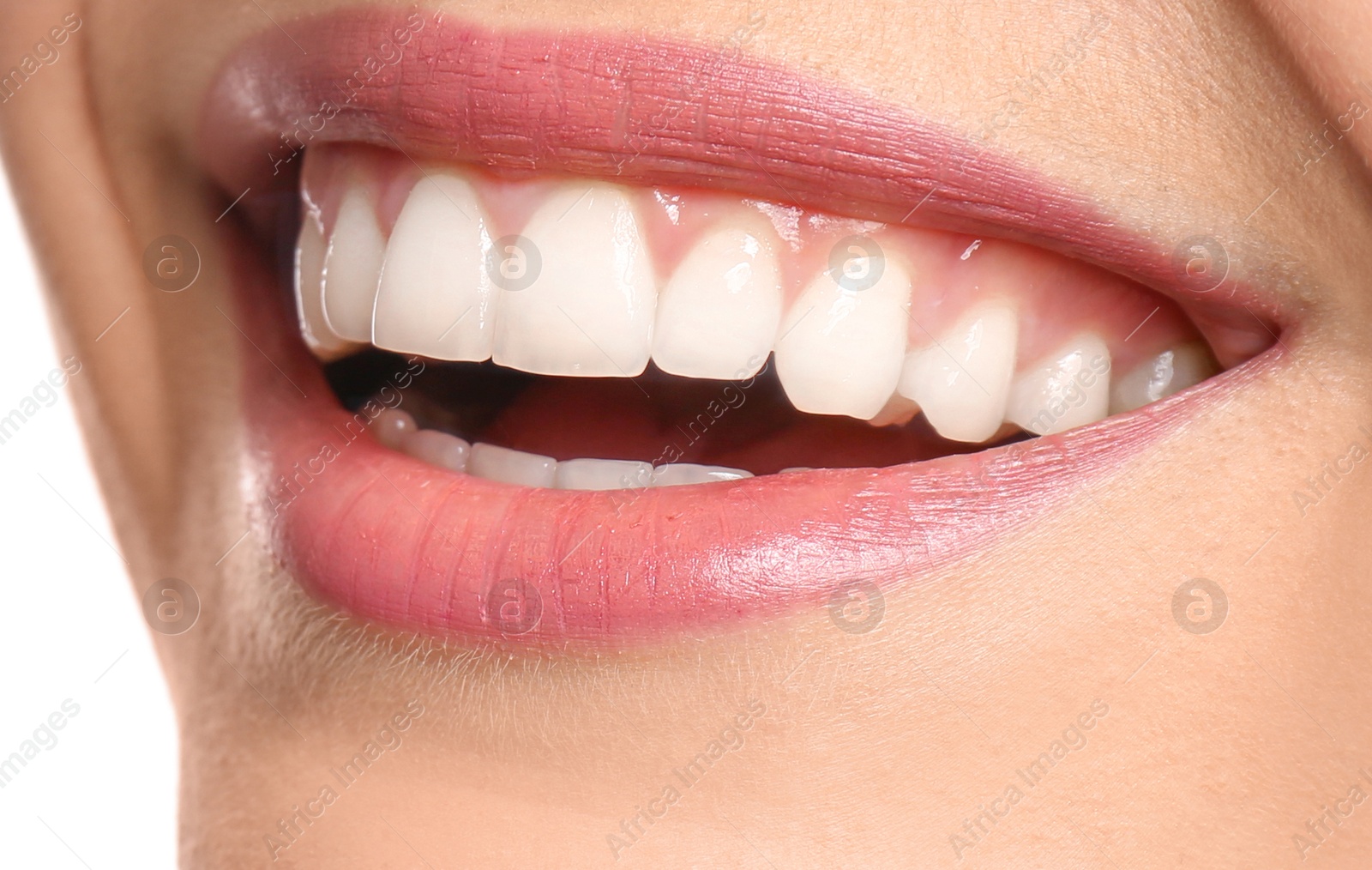 Image of Young woman with healthy teeth and beautiful smile, closeup