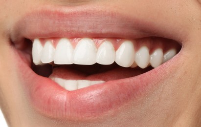 Young man with healthy and white teeth, closeup