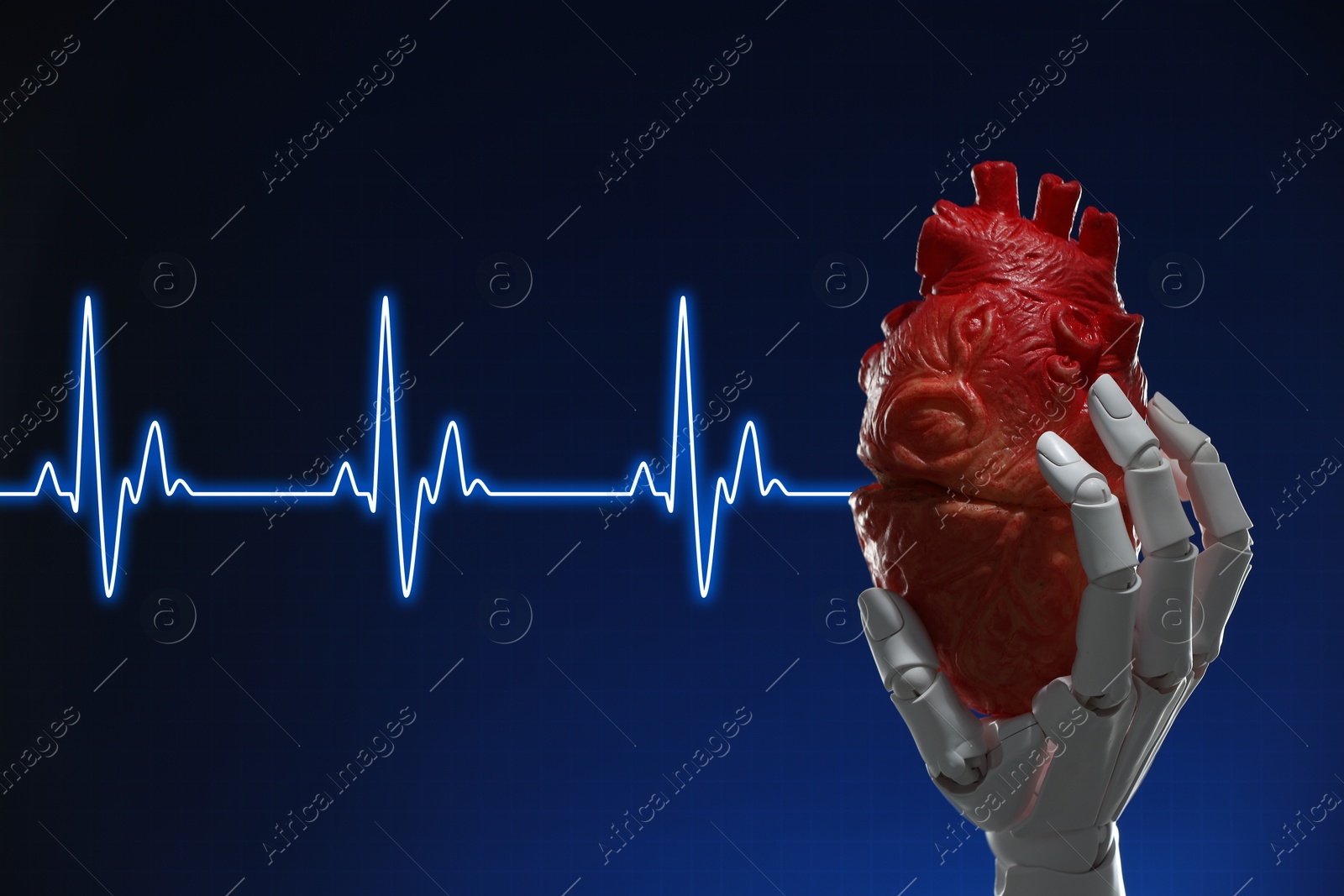 Image of Cardiology. Robot hand holding anatomical model of heart on gradient background. Blue heartbeat line