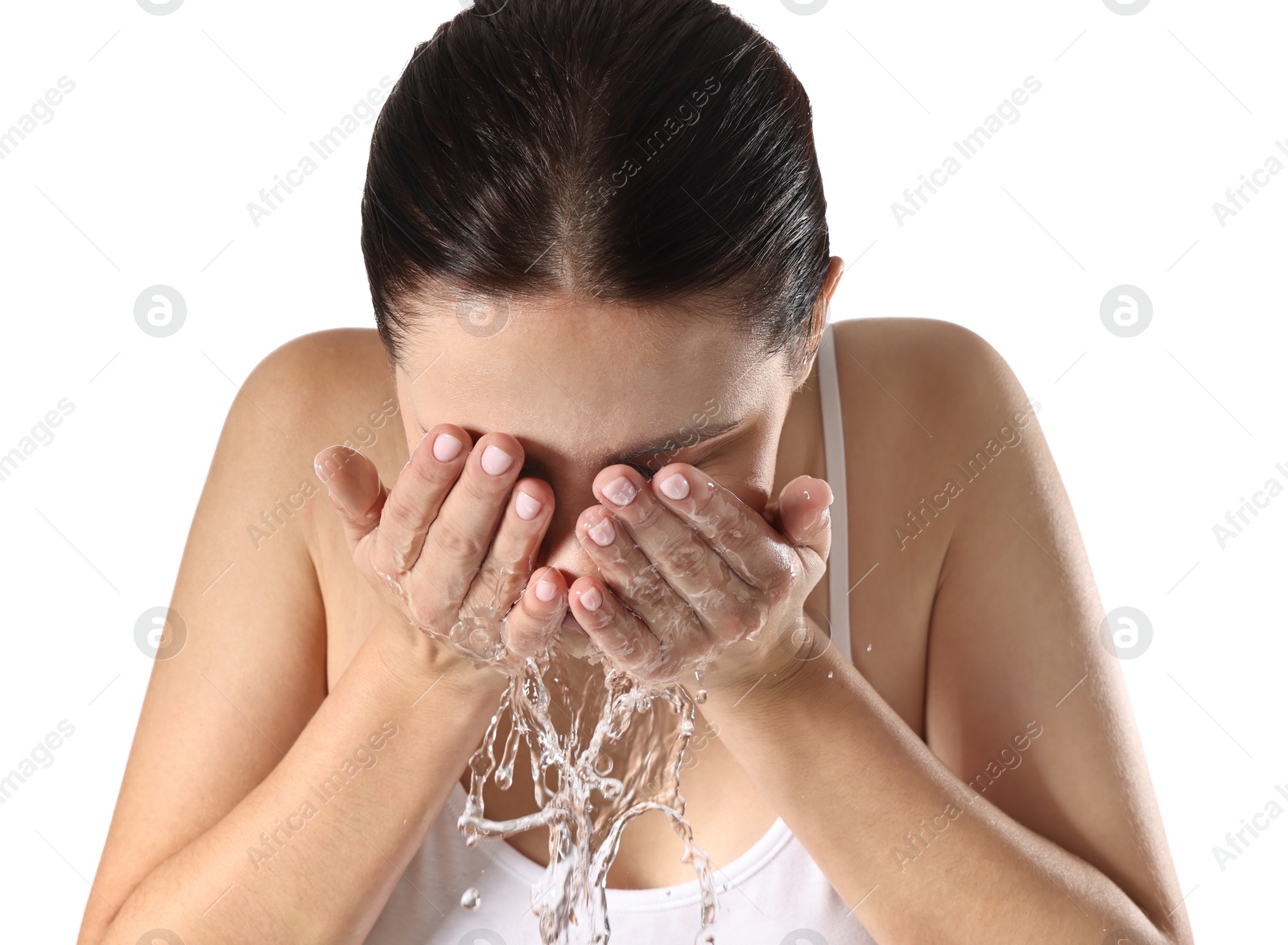 Photo of Woman washing her face on white background