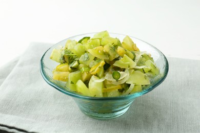 Photo of Delicious salsa (Pico de gallo) in bowl on white table, closeup