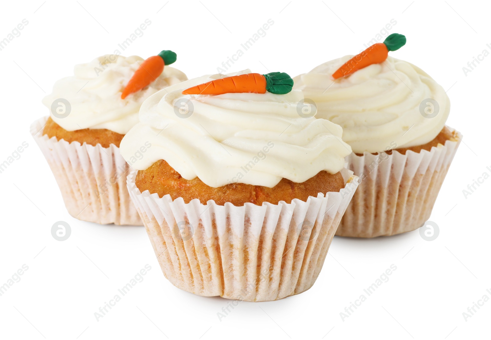 Photo of Delicious carrot cupcakes isolated on white. Yummy dessert