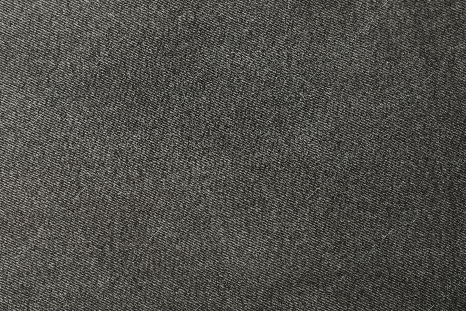 Photo of Texture of black jeans as background, closeup