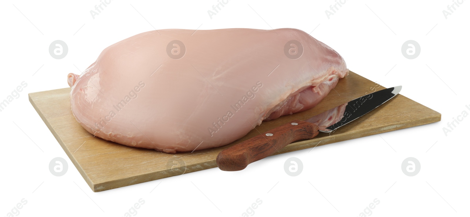 Photo of Raw turkey breast and knife isolated on white