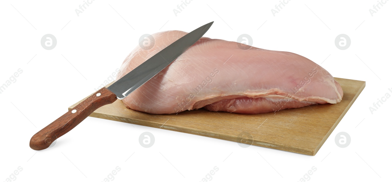 Photo of Raw turkey breast and knife isolated on white