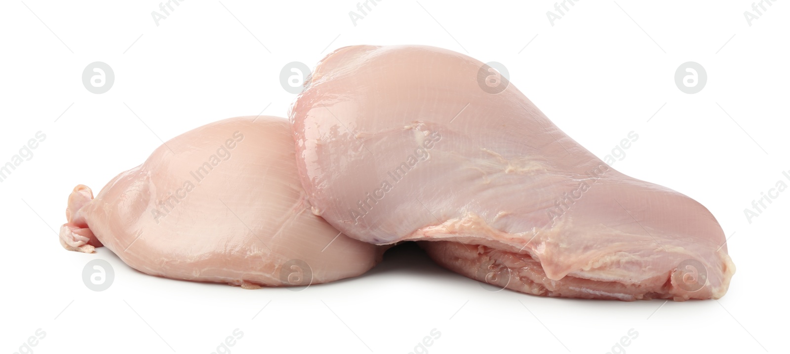 Photo of Two raw turkey breasts isolated on white