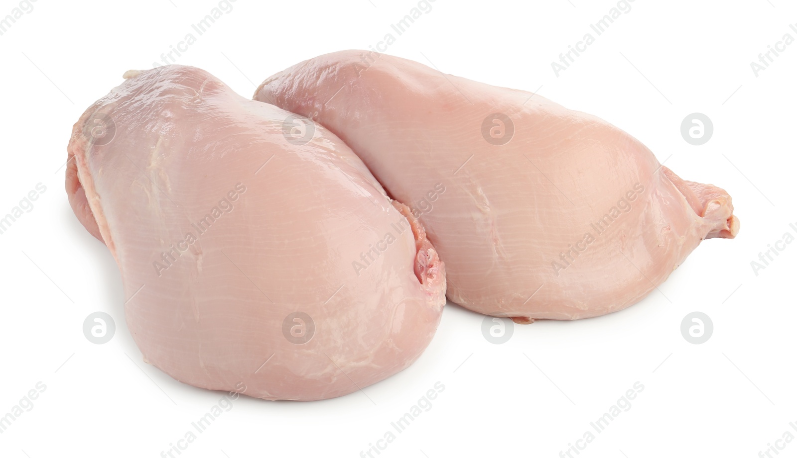 Photo of Two raw turkey breasts isolated on white