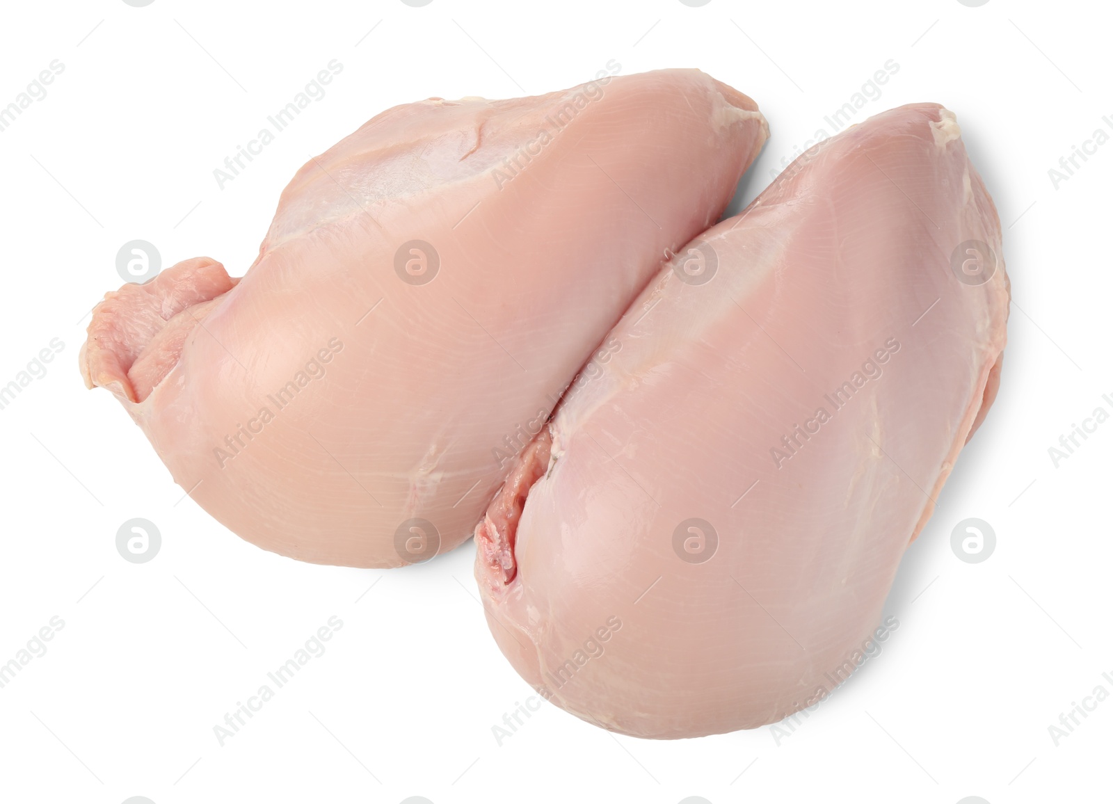 Photo of Two raw turkey breasts isolated on white, top view