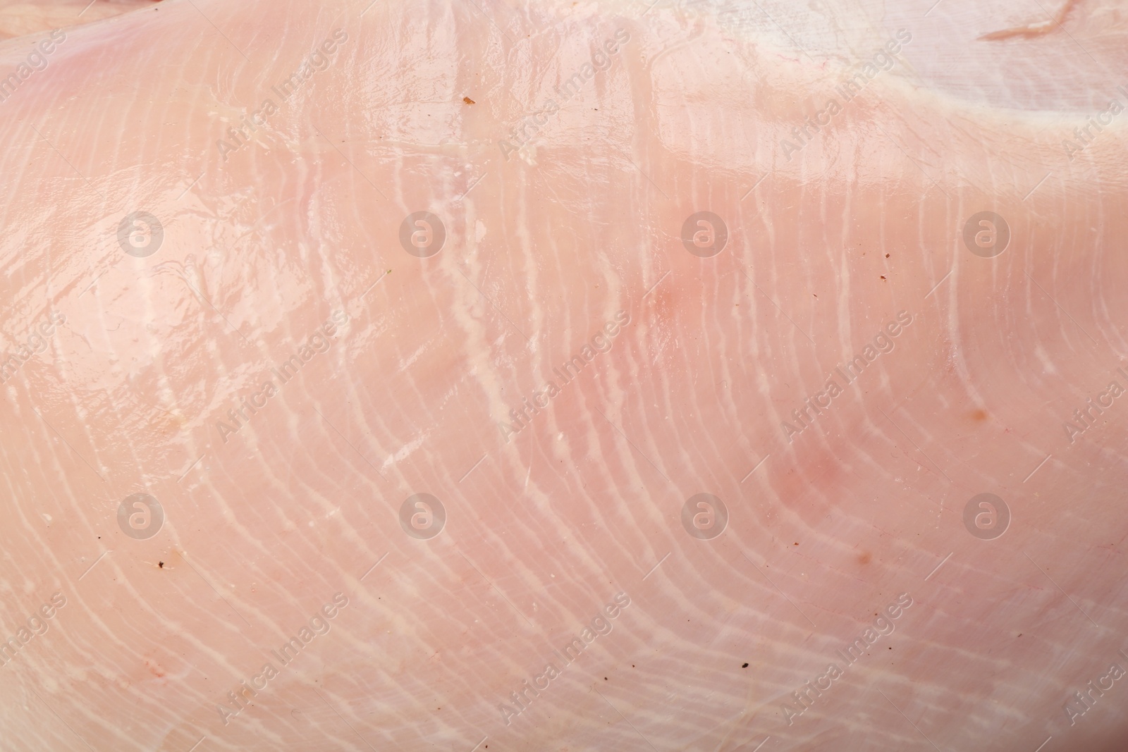 Photo of Raw turkey breast as background, closeup view