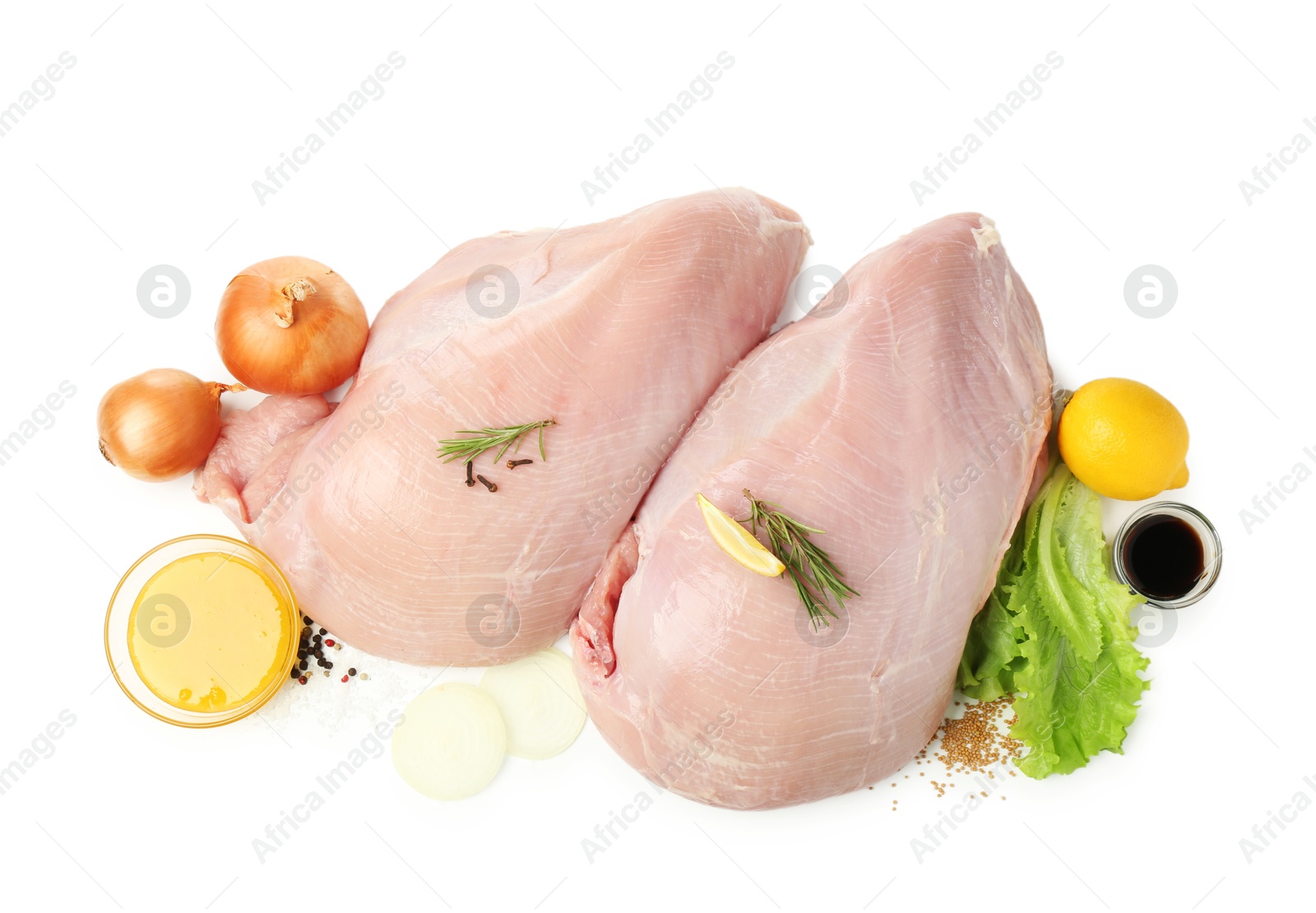 Photo of Raw turkey breasts and spices isolated on white, top view