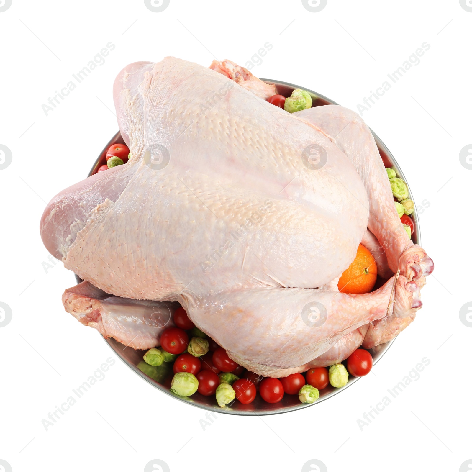 Photo of Whole raw turkey with vegetables isolated on white, top view