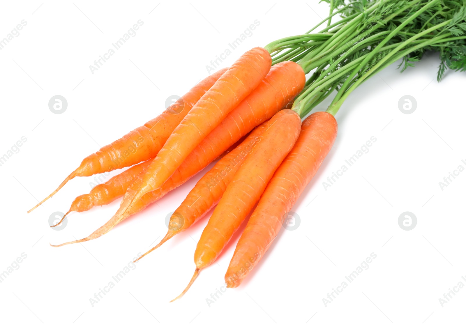 Photo of Fresh carrots isolated on white. Root vegetable