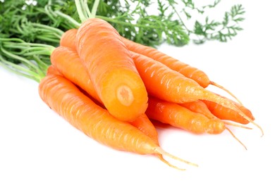 Photo of Fresh carrots isolated on white. Root vegetable