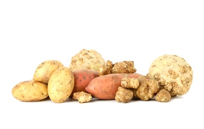 Photo of Many different root vegetables isolated on white