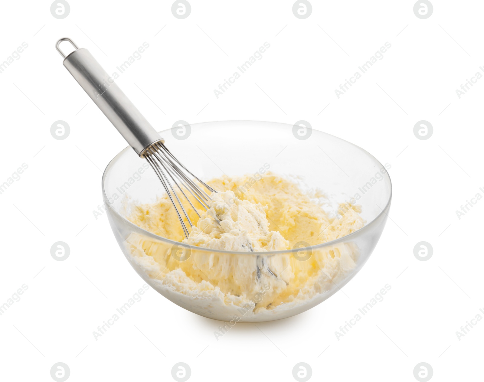 Photo of Bowl and whisk with delicious cream isolated on white