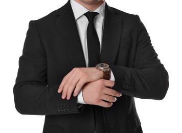 Photo of Man in classic suit with stylish watch on white background, closeup