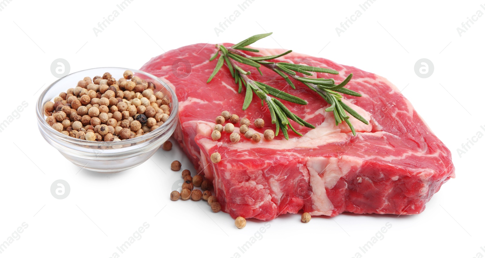 Photo of Piece of raw beef meat and spices isolated on white