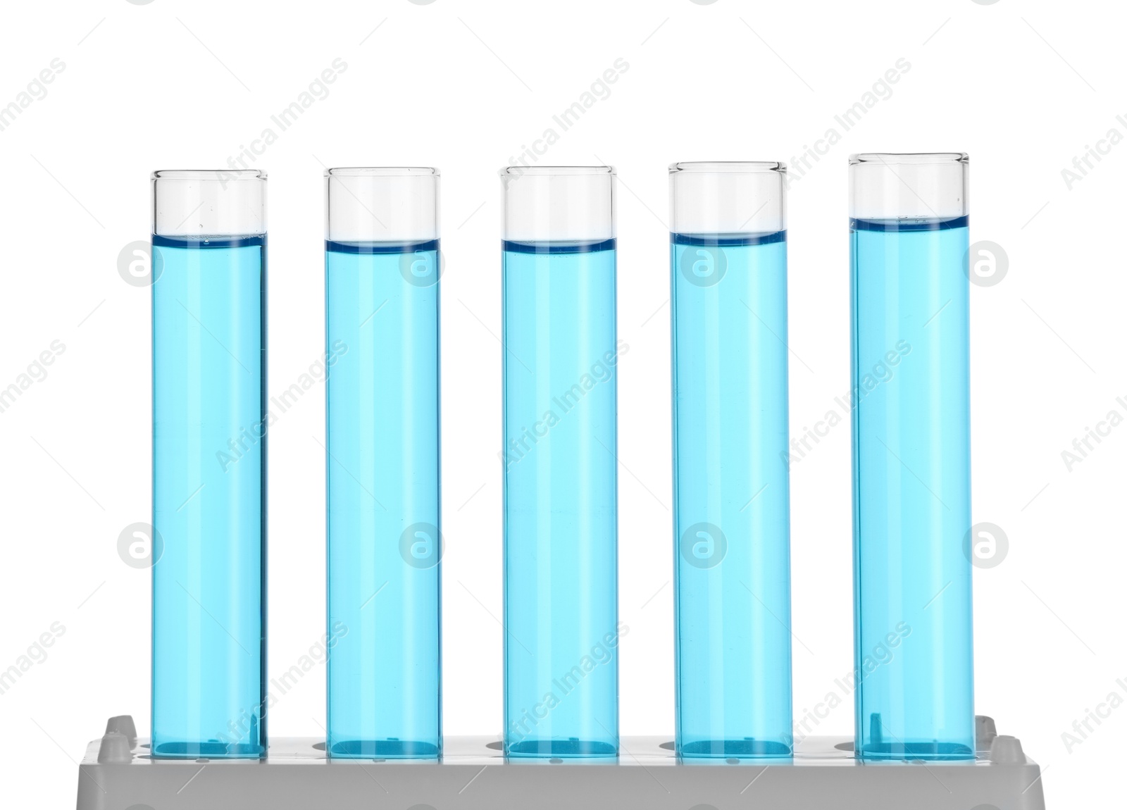 Photo of Test tubes with blue liquid isolated on white