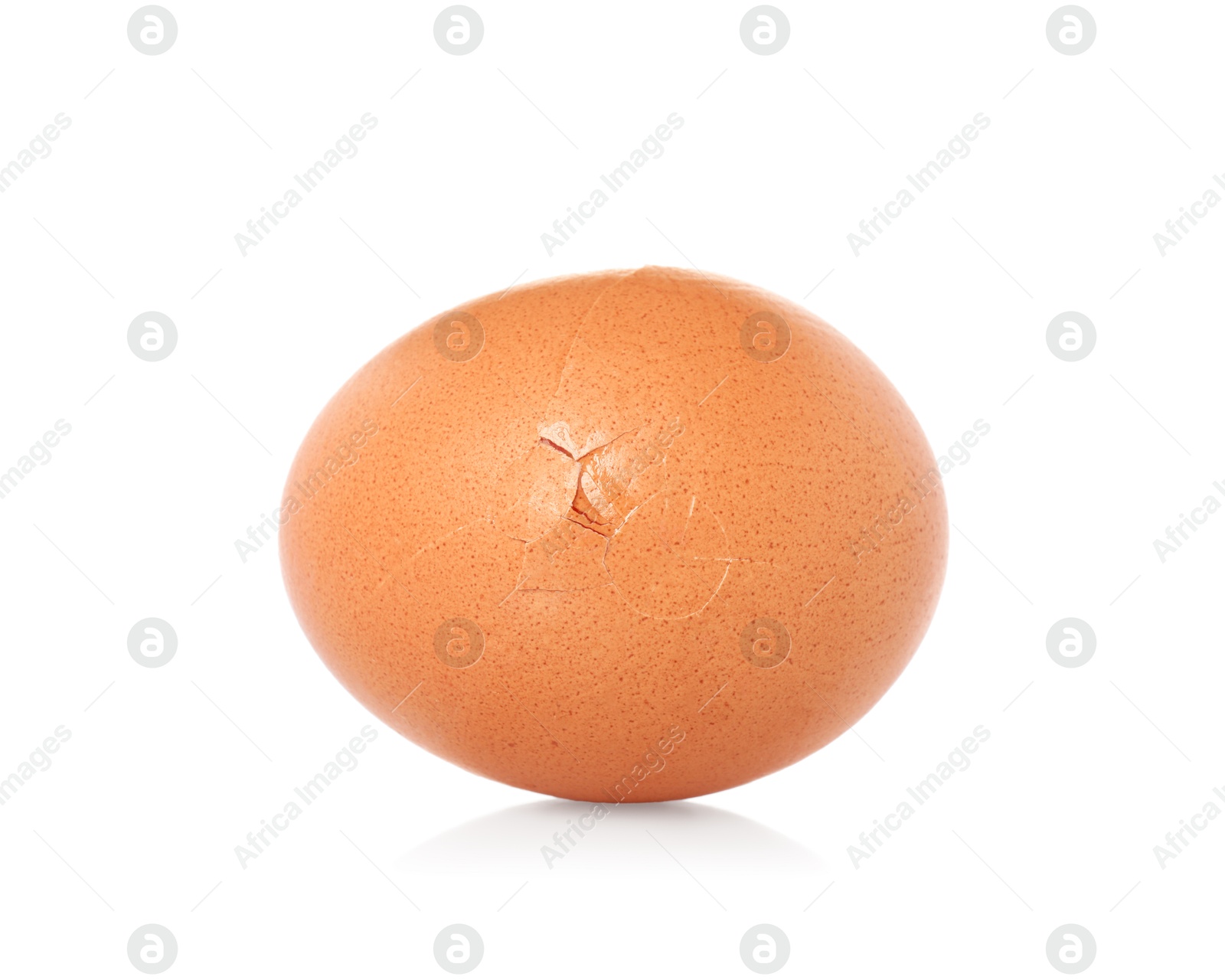 Photo of One piece of broken eggshell on mirror surface against white background