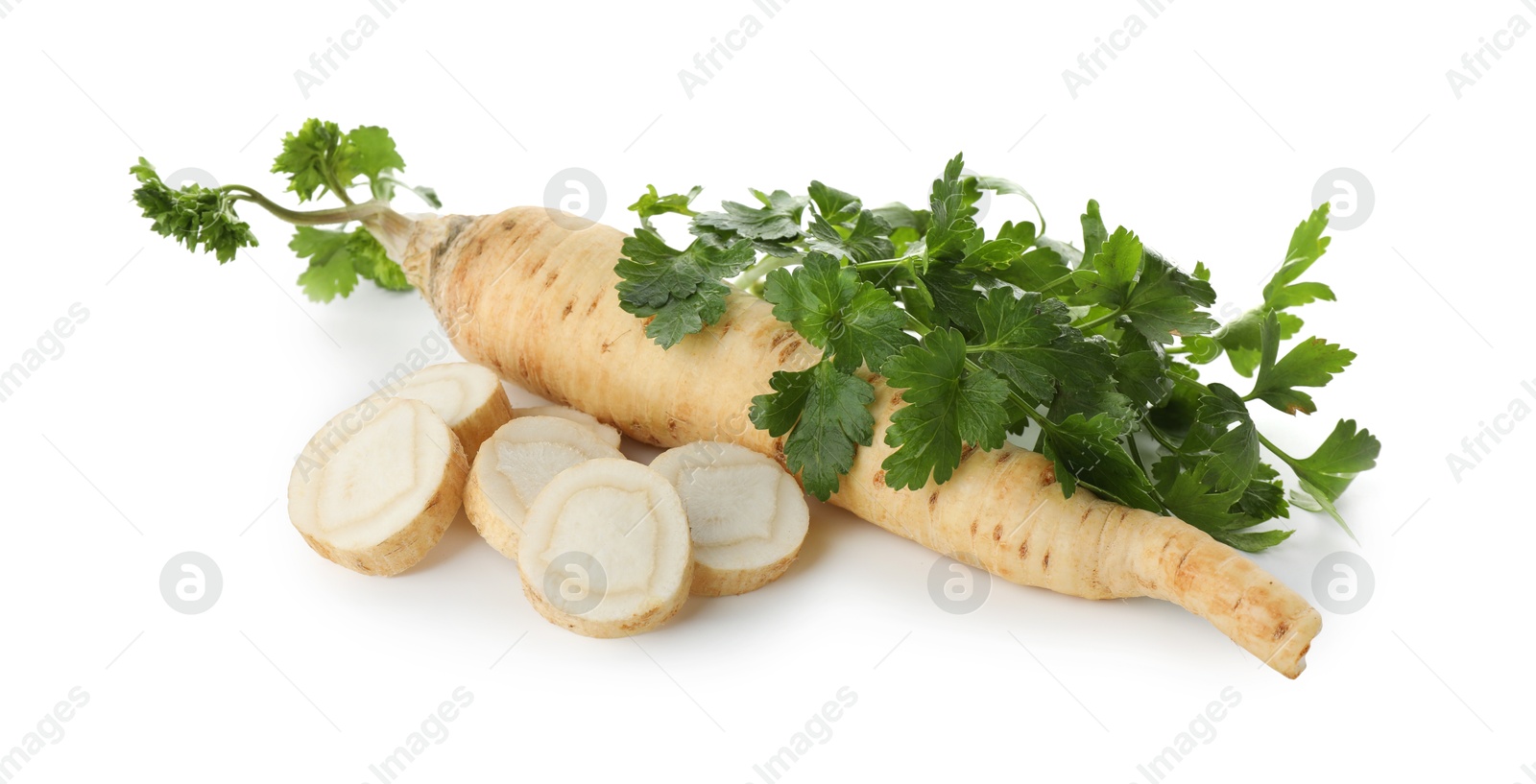 Photo of Fresh parsley and roots isolated on white