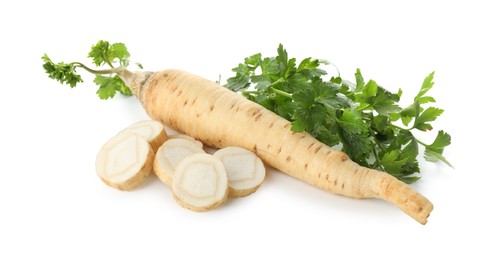 Photo of Fresh parsley and roots isolated on white