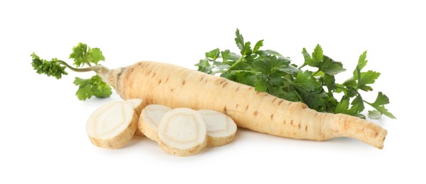 Photo of Fresh parsley and roots isolated on white