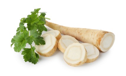 Photo of Fresh parsley and cut roots isolated on white