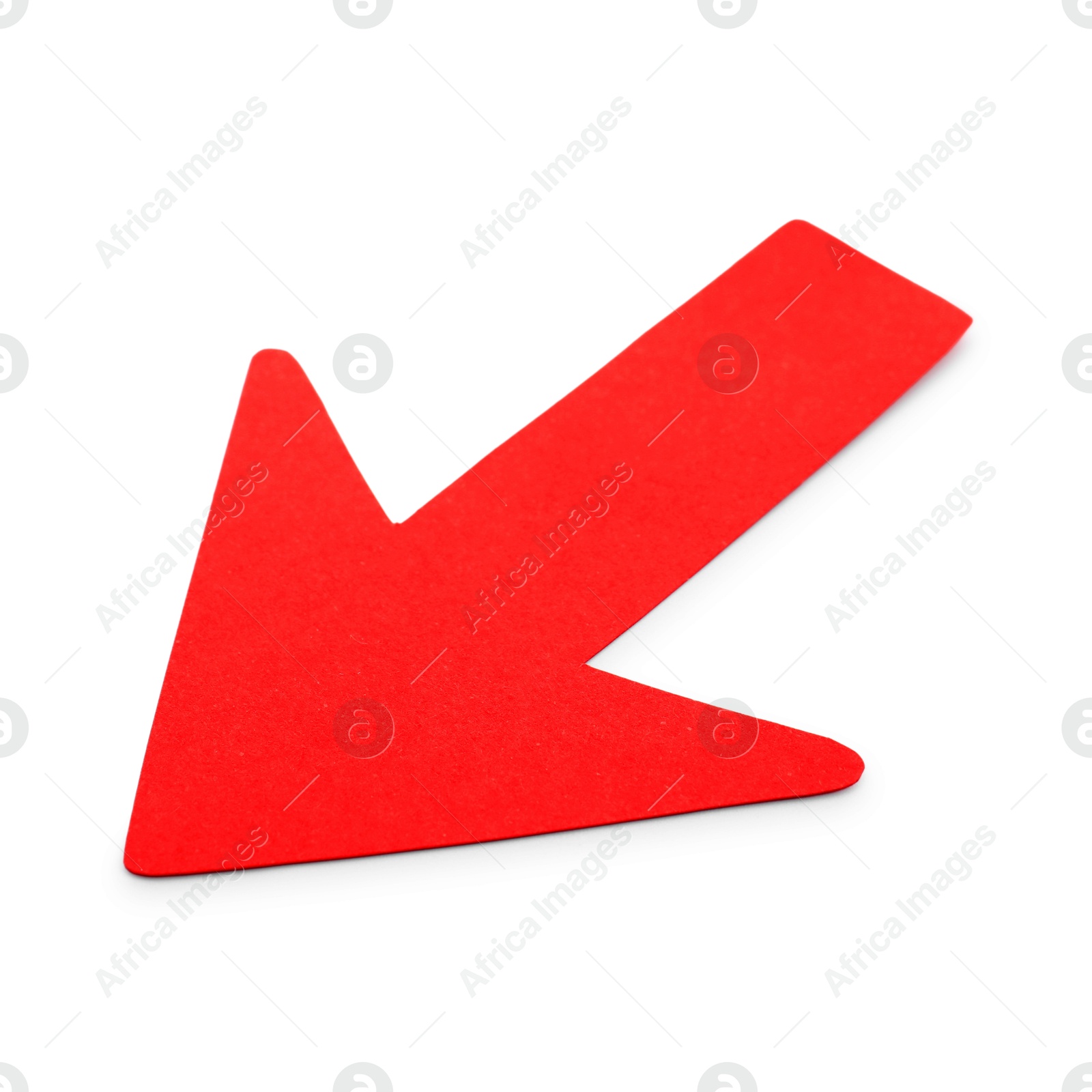 Photo of One red paper arrow isolated on white