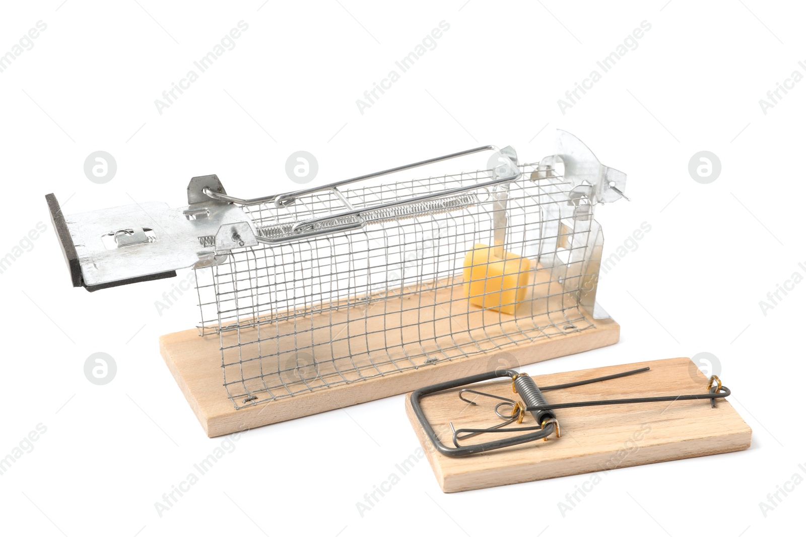 Photo of Two mouse traps with cheese isolated on white