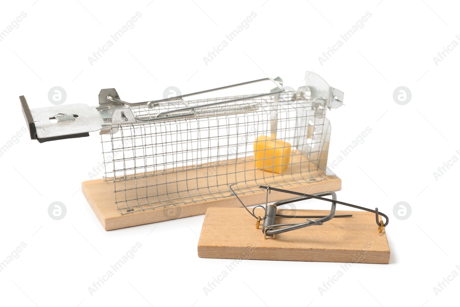 Photo of Two mouse traps with cheese isolated on white