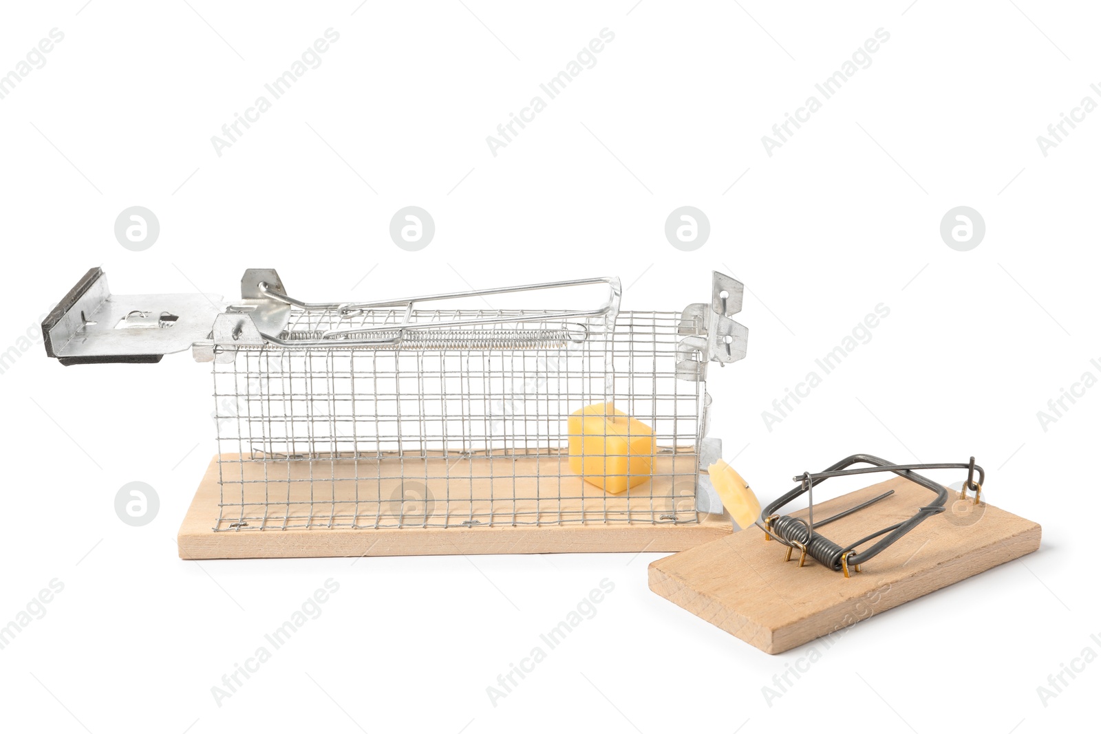 Photo of Two mouse traps with cheese isolated on white