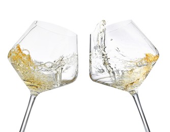 Image of Glasses of splashing wine isolated on white