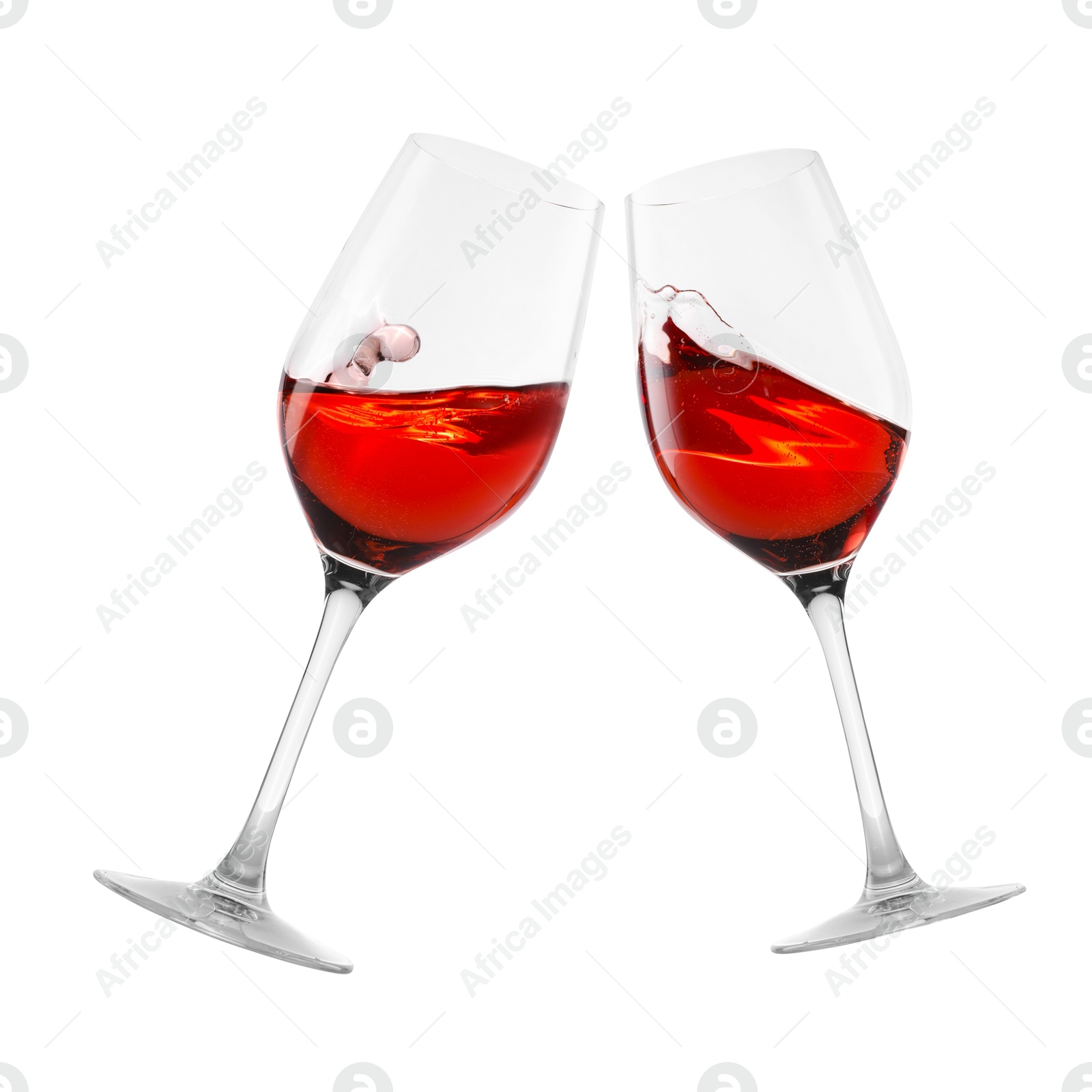 Image of Glasses of splashing red wine isolated on white