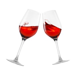 Image of Glasses of splashing red wine isolated on white