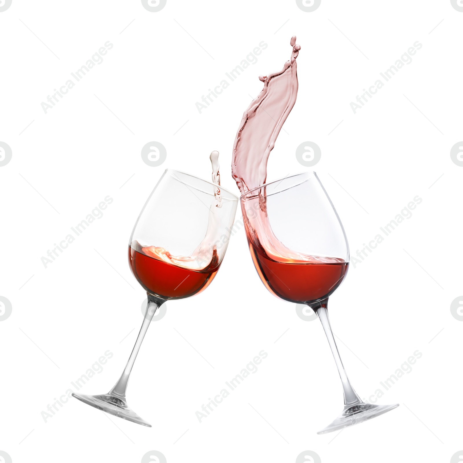 Image of Glasses of splashing red wine isolated on white