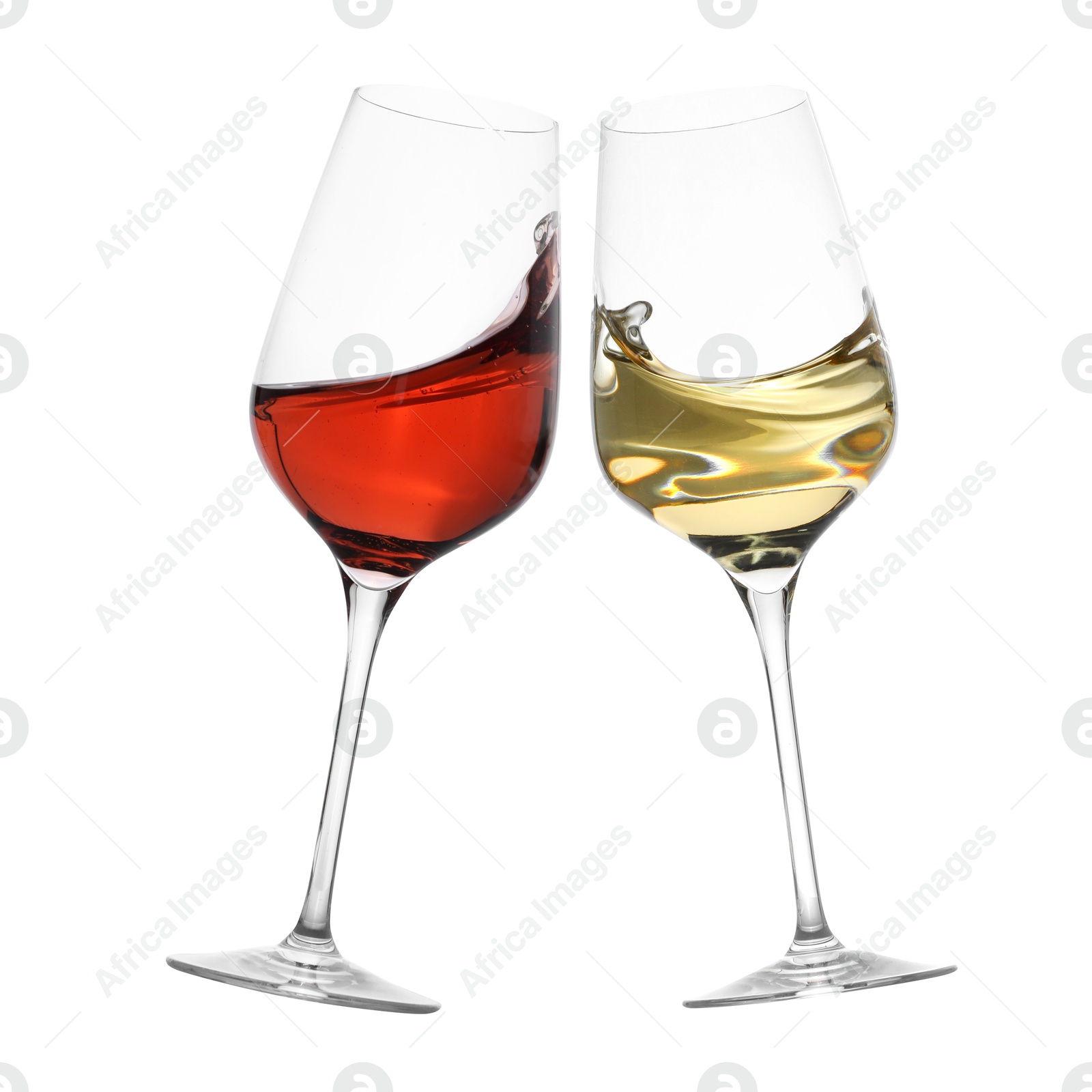 Image of Glasses of splashing wine isolated on white