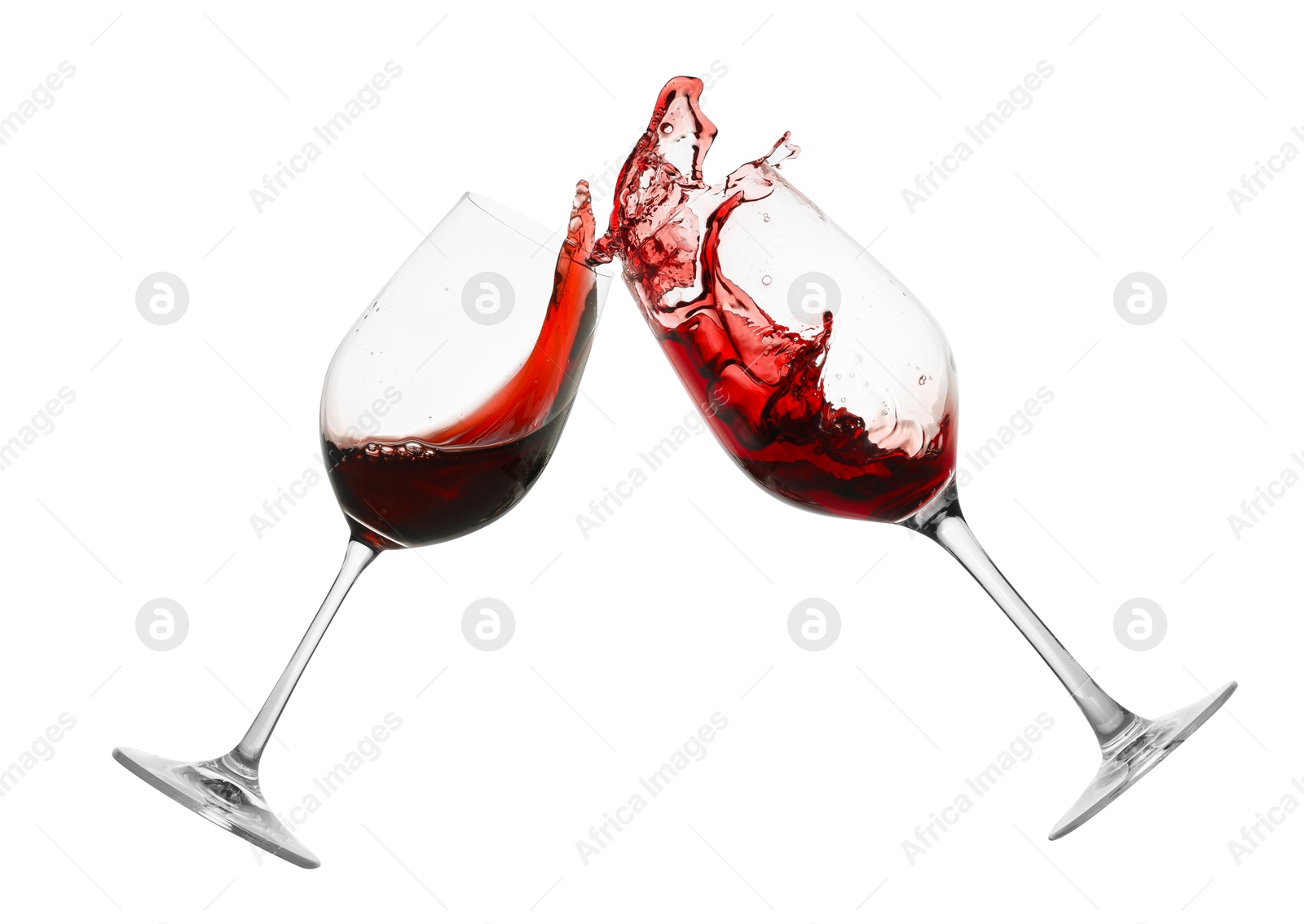 Image of Glasses of splashing red wine isolated on white