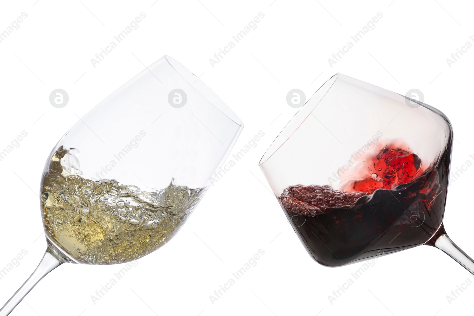 Image of Glasses of splashing wine isolated on white