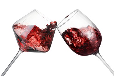 Image of Glasses of splashing red wine isolated on white