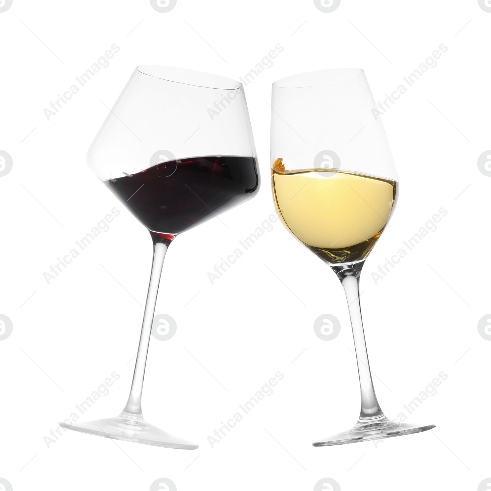 Image of Glasses of splashing wine isolated on white