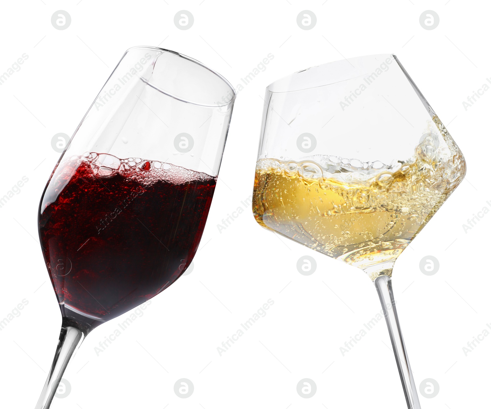 Image of Glasses of splashing wine isolated on white