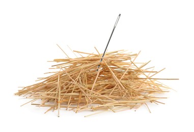 Image of Sewing needle in hay on white background