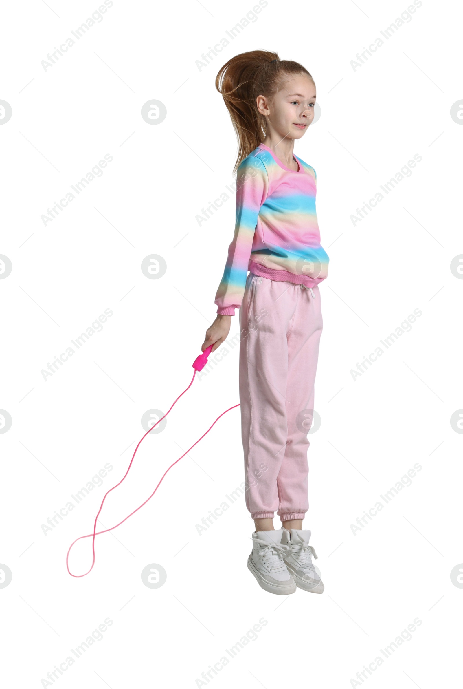 Photo of Cute little girl with jump rope on white background