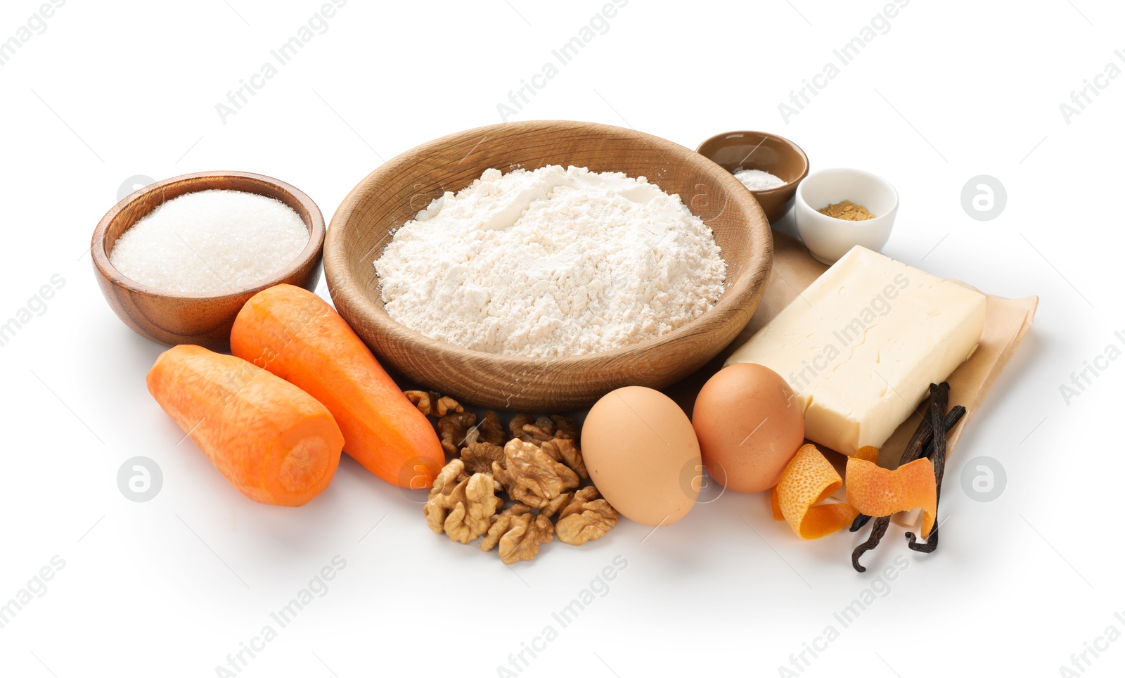 Photo of Different ingredients for making carrot cake isolated on white